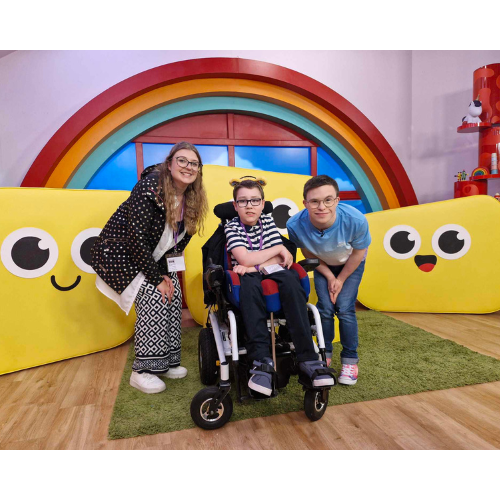 Lora and Phoenix with CBeebies presenter George Webster